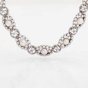 A.Tillander, a platinum necklace/bracelet, with brilliant-cut diamonds totalling approx. 6.72 ct and cultured pearls.