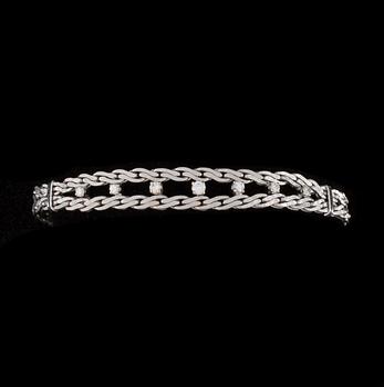 ARMBAND, 14K vitguld, briljantslipade diamanter. Vikt ca 18,1 g.