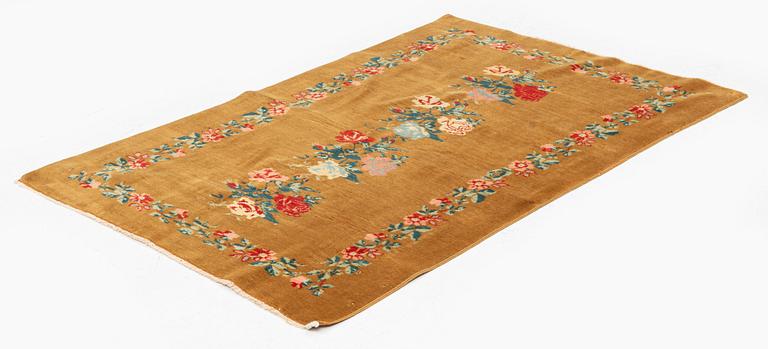 An antique Anatolian rug, Ottoman Empire, c. 107 x 75 cm.