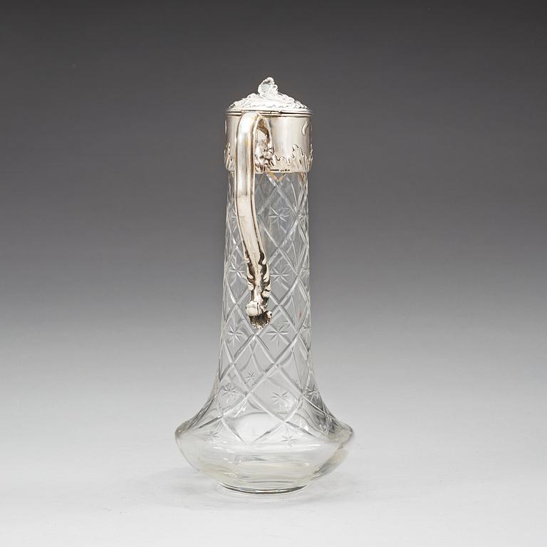 A Swedish 20th century parcel-gilt and cut glass decanter, marks of W.A. Bolin, Stockholm possibly 1918.