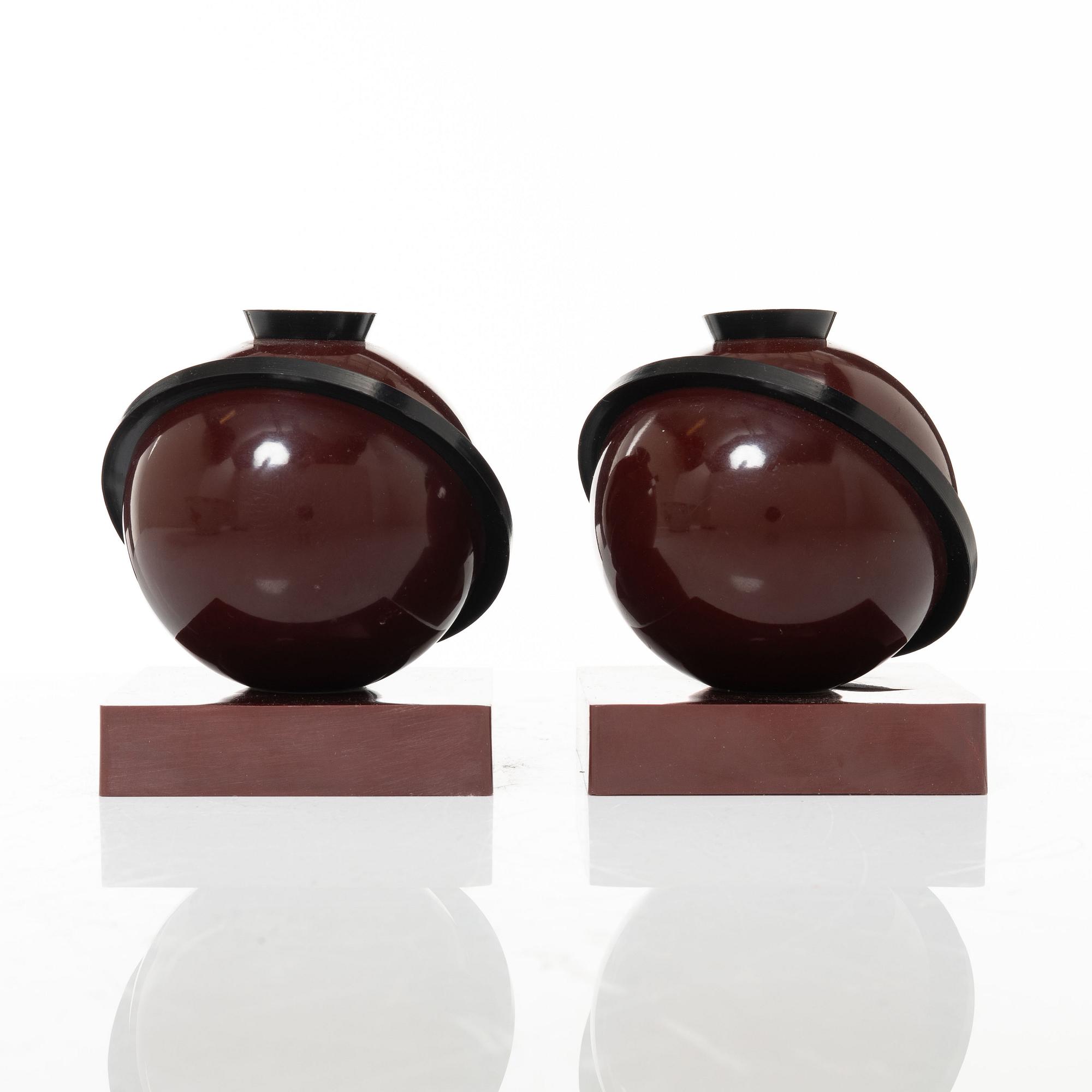 A pair of 'Saturnus' candleholders, 1930s.