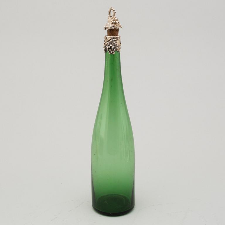 A silver mounted winebottle, Birmingham 1839.