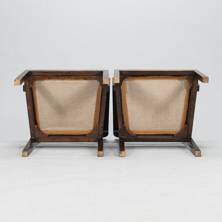 A pair of 1930's armchairs.