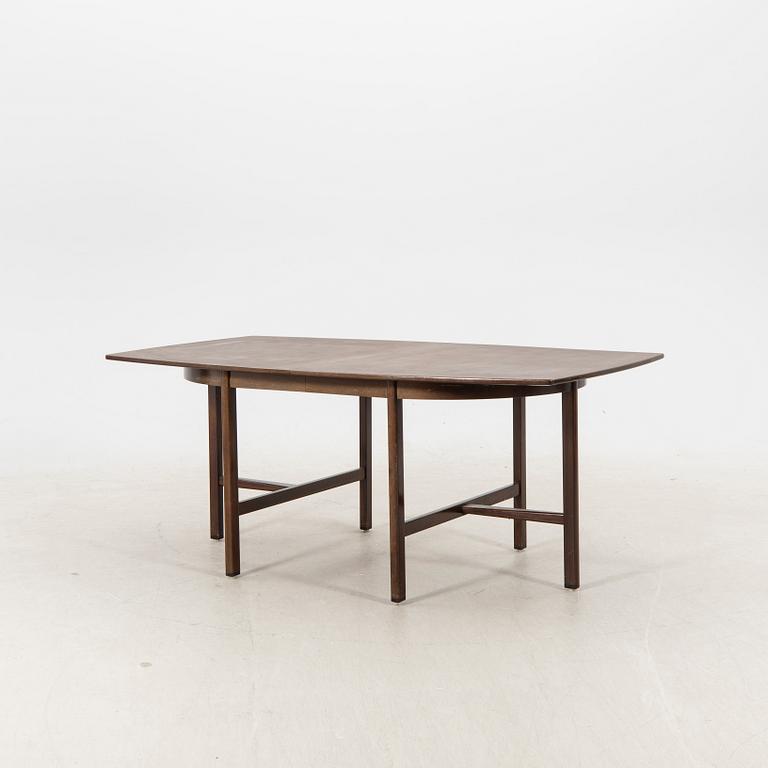 A table and four chairs in lacquered mahogany by David Rosén, "Triva-diné", middle of the 20th century.