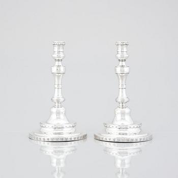 A pair of Swedish Rococo silver candlesticks, mark of Pehr Zethelius, Stockholm 1775.