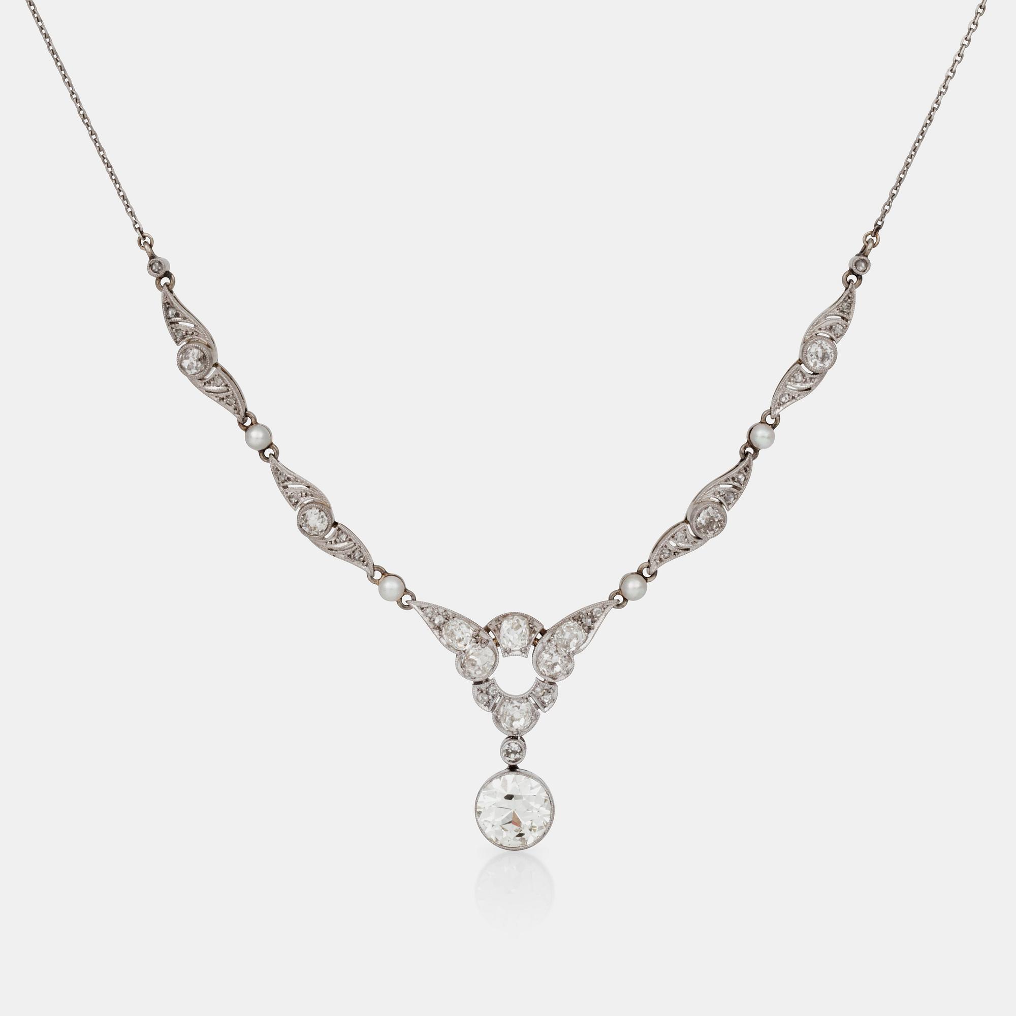 COLLIER med gammalslipade diamanter och pärlor, 1910-tal.