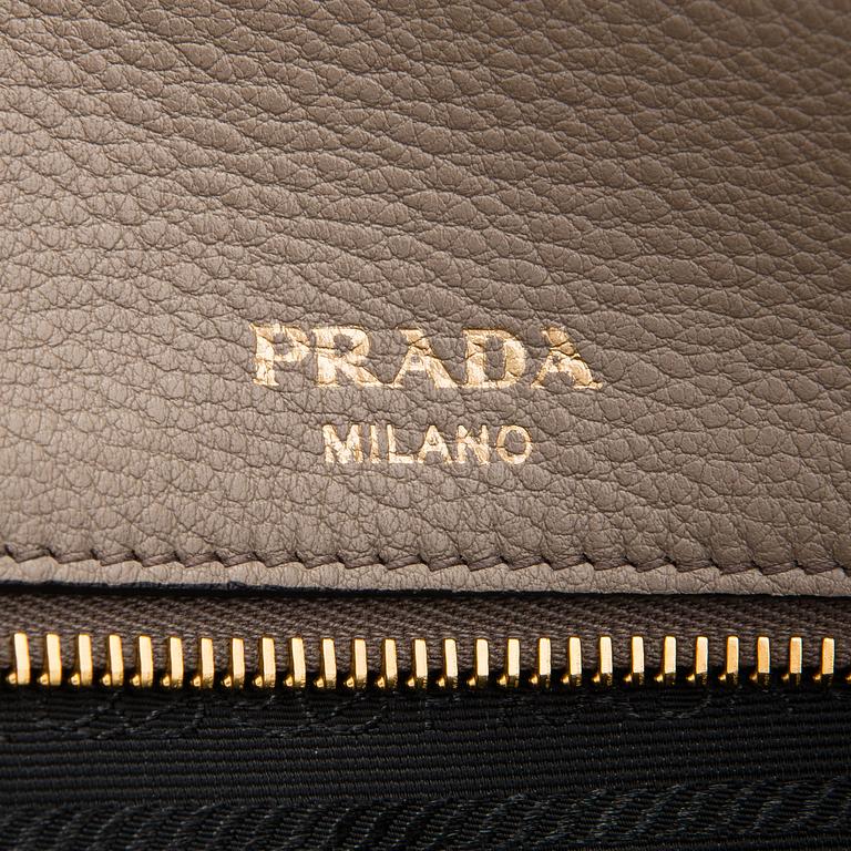 Prada, a clay gray leather handbag, 2020.