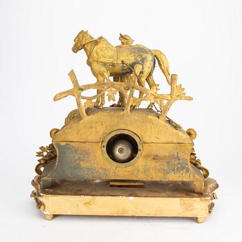 A late 19th century gilded table clock.