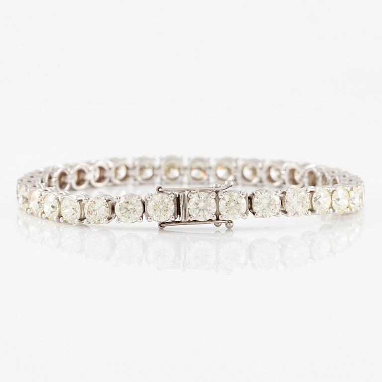 Tennis bracelet, 18K white gold with brilliant-cut diamonds.