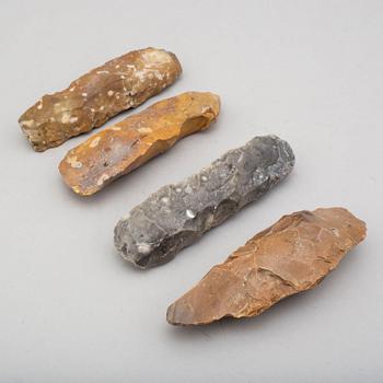 Four early neolithic flint axes.