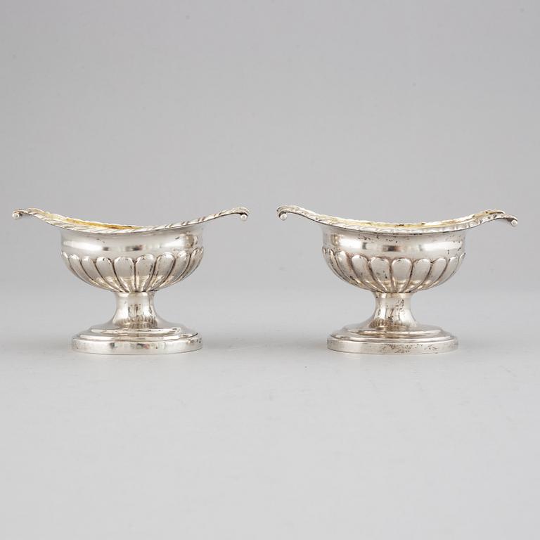 A pair of 19th century parcel-gilt silver salt-cellars, unidentified marks.