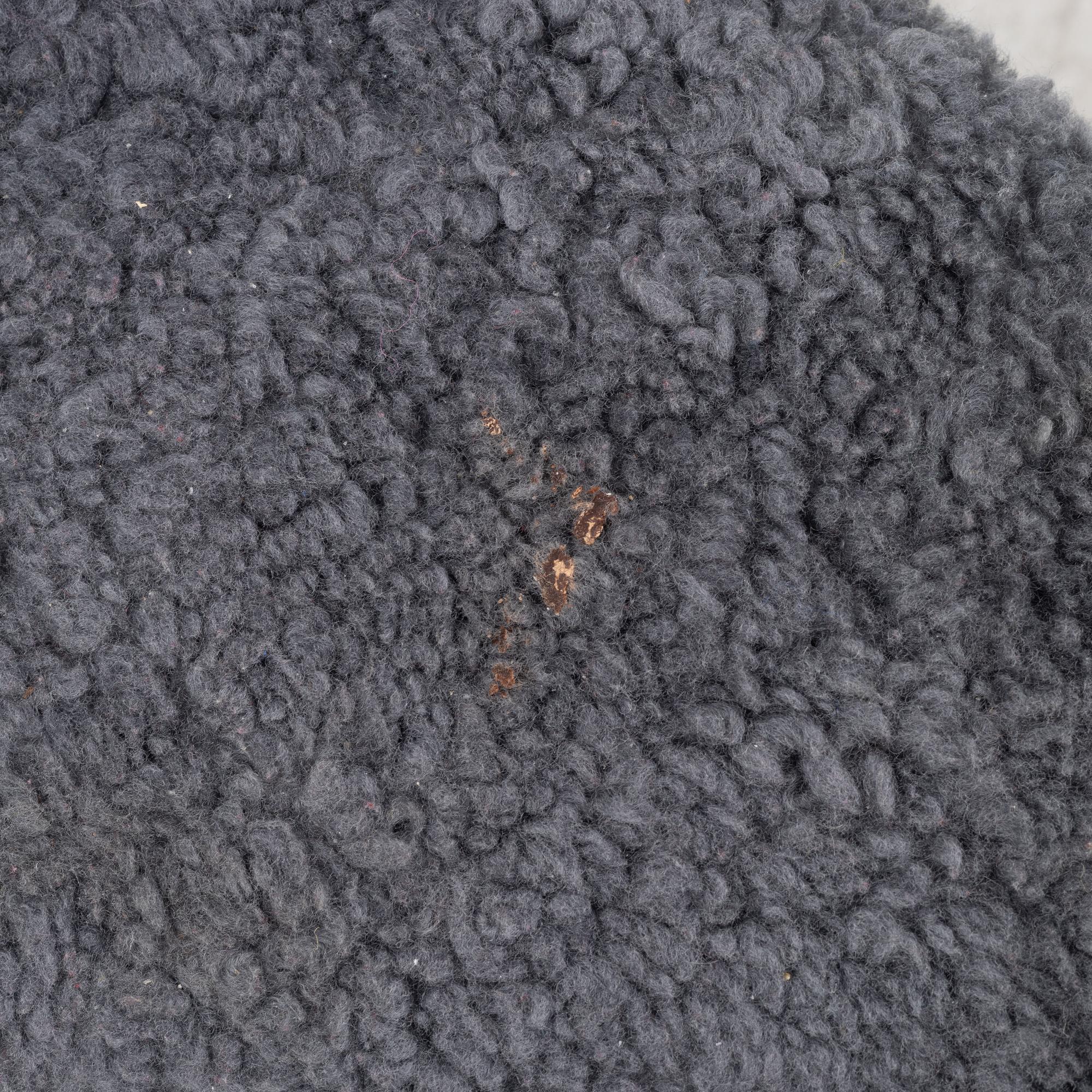 Yngve Ekström, fåtölj med fotpall, ”Lamino”,  Swedese, 2009.