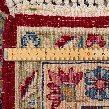 A semi-antique Kirman carpet, c. 275 x 180 cm.