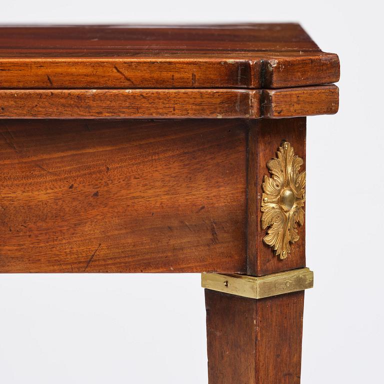 A Gustavian 'concertina action' mahogany games table by Georg Haupt (master in Stockholm 1770-84).