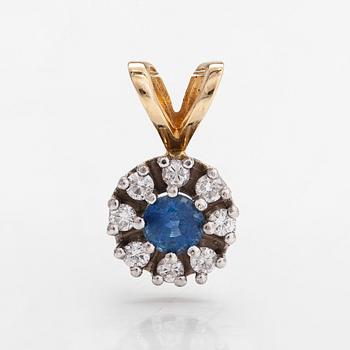 A 14K gold pendant with sapphire and diamonds approx. 0.20 ct in total.