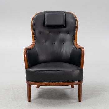 Carl Malmsten, a mahogany 'Advokaten' armchair.