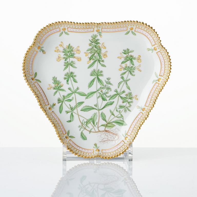 A set with a Royal Copenhagen 'Flora Danica' triangular dish, a sugar bowl with cover and three small dishes, Denmark,