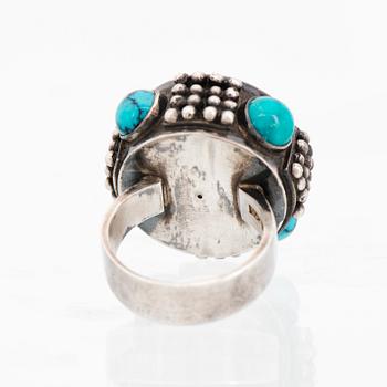 SAARA HOPEA, SORMUS, pyöröhiotut turkoosit, hopeaa. Ossian Hopea, Porvoo 1963.