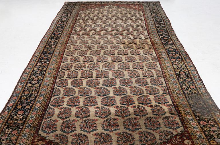 A Bakhtiari carpet, signed, c. 580 x 212 cm.
