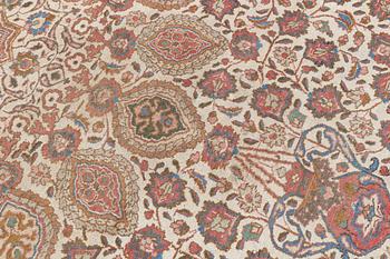 A Tabriz carpet, c. 390 x 305 cm.