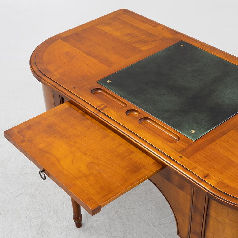 A Cherry wood desk, mid 20th century.