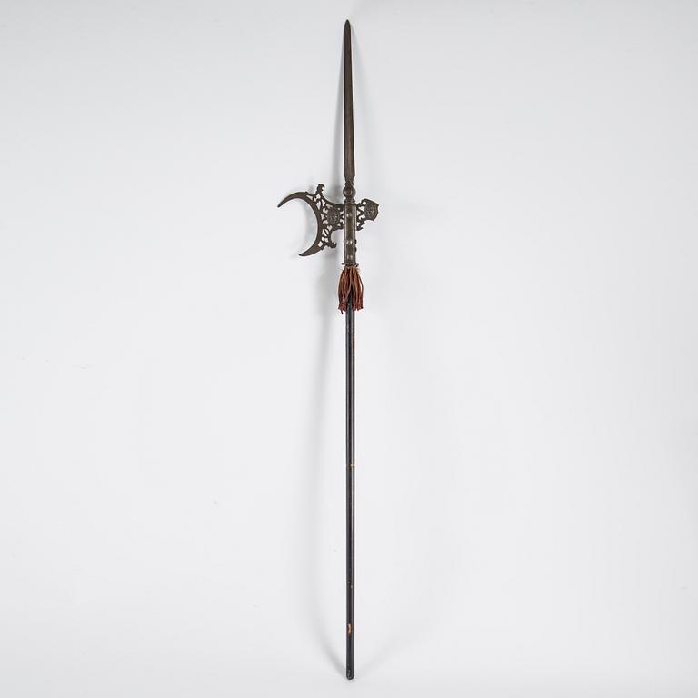 Two swords, shield  and a halberd, late 19th century.