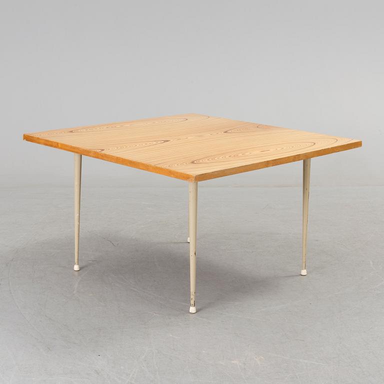 A coffee table marked Tapio Wirkkala, Asko, Made in Finland.