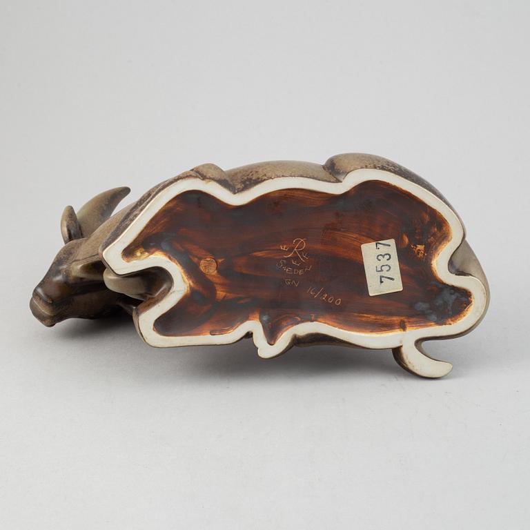 Gunnar Nylund, a stoneware sculpture of a reclining buffalo, Rörstrand, number 16/200.