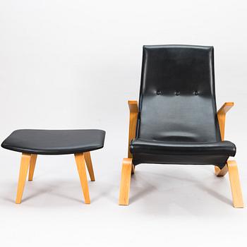 EERO SAARINEN, fåtölj samt fotpall, "Grasshopper", licenstillverkad av Tetrimäki Finland.