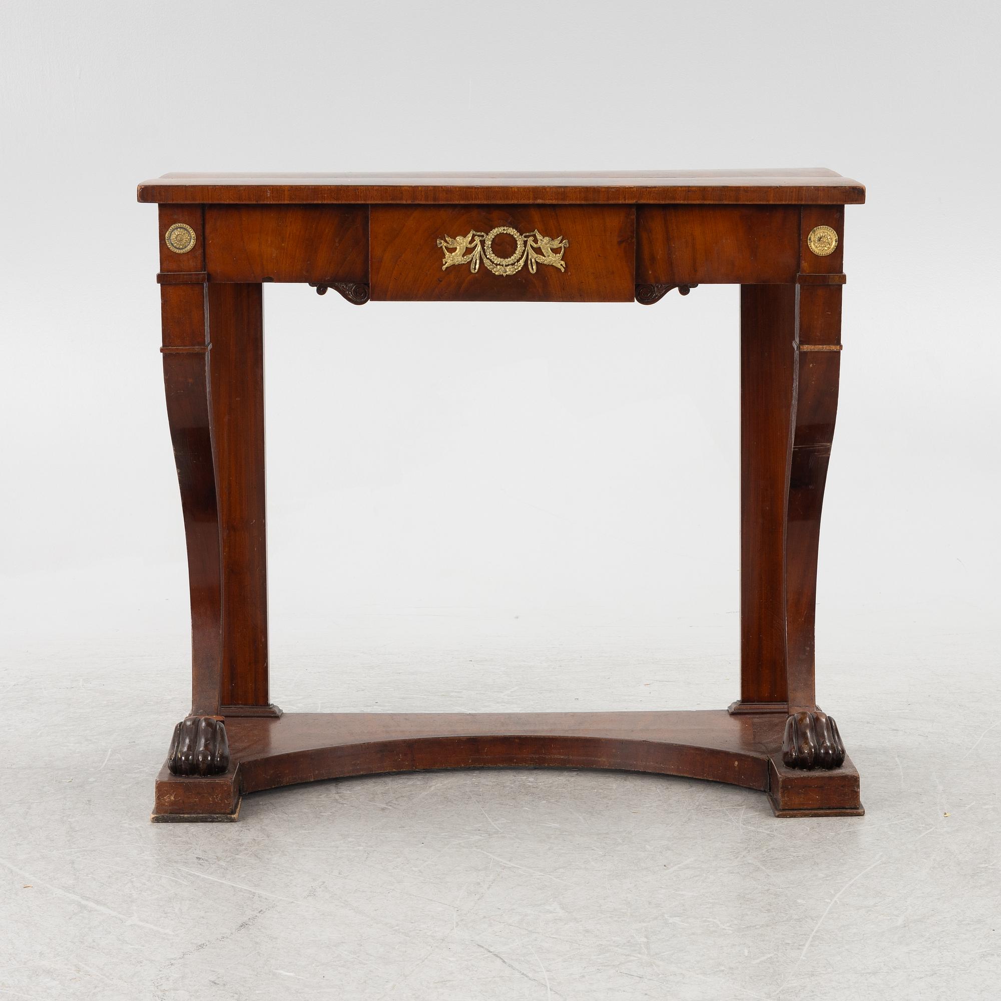 An empire console table, firts half of the 19th century.