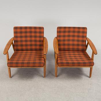 A pair of second half of the 20th century easy chairs.