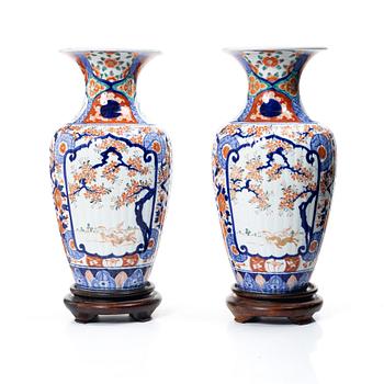 A pair of Japanese floor vases with Imari decoration. 19th century.