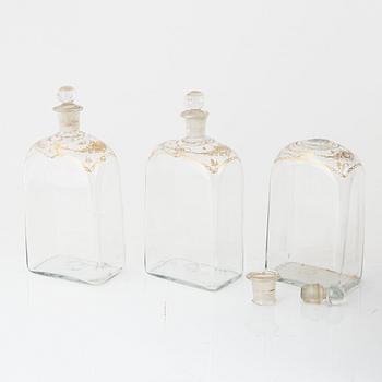 A box with twelve glass bottles, first half of the 19th Century.