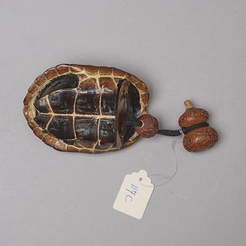 A Japanese turtle inro with ojime and bottle, Meiji period (1868-1912).