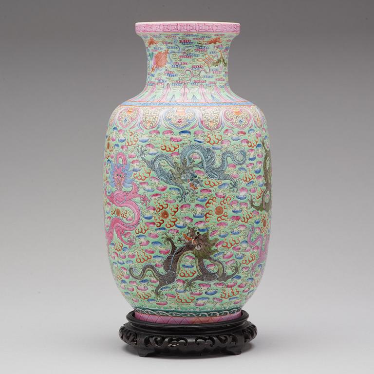 A famille rose and green ground vase, Republic (1912-49), with Qianlong six character mark.