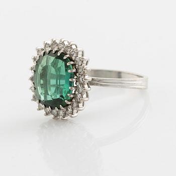 Green tourmaline and eight cut diamond cocktail ring.