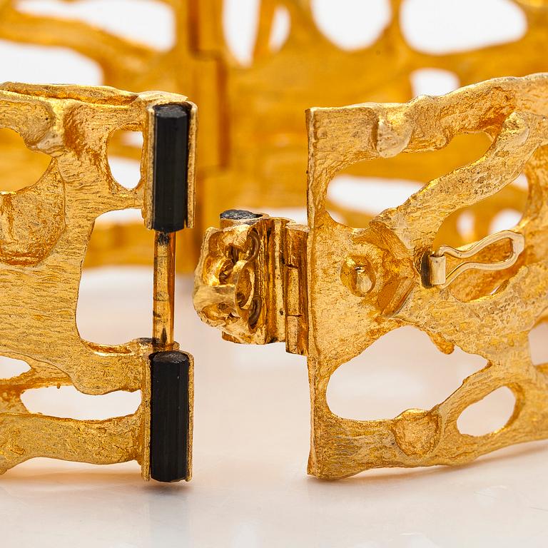 Björn Weckström, an 18K gold and tourmaline 'Sacrificial fire' bracelet. Lapponia 1971.