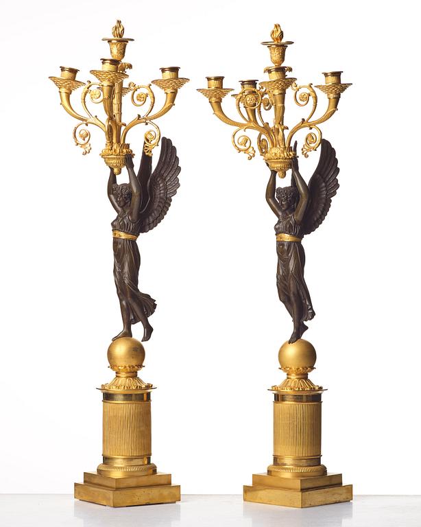 A pair of French  Empire five-light candelabra, sign. Rabiat, bronze maker in Paris 1756-1815.