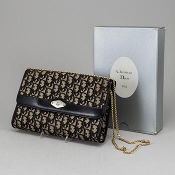 CHRISTIAN DIOR, a monogran  clutch.