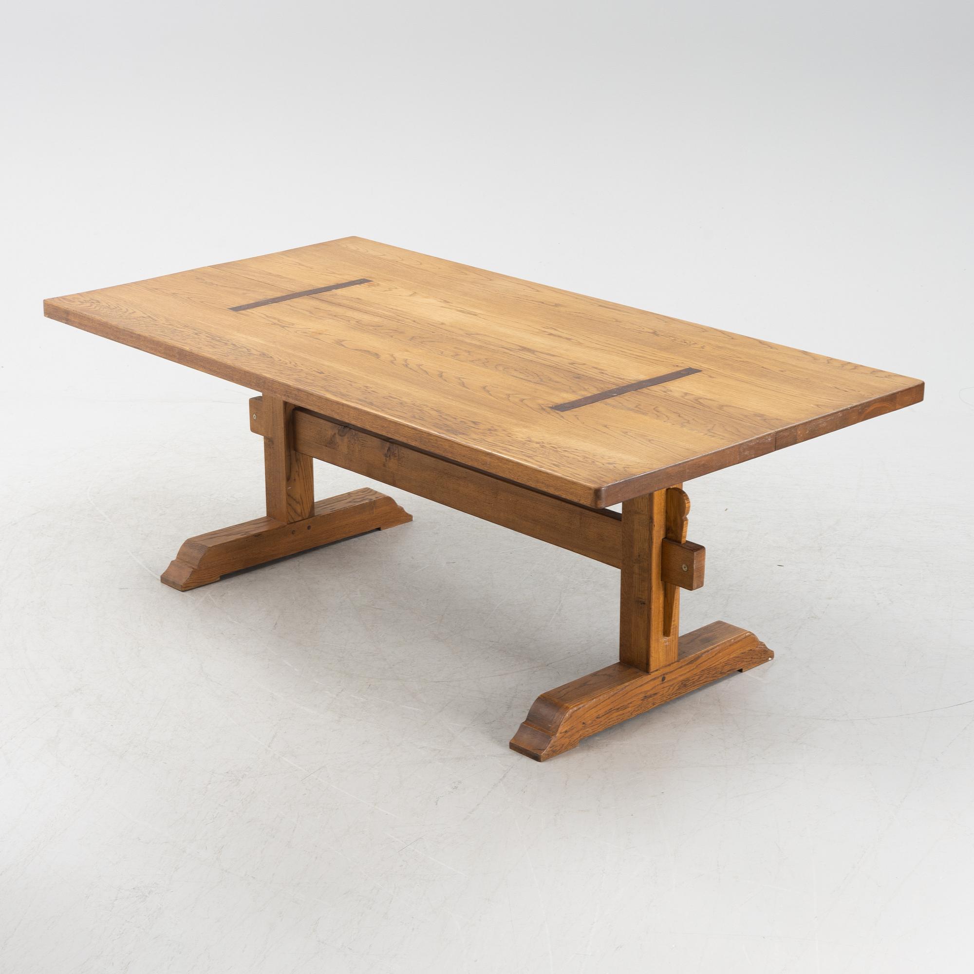 An oak trestle table.
