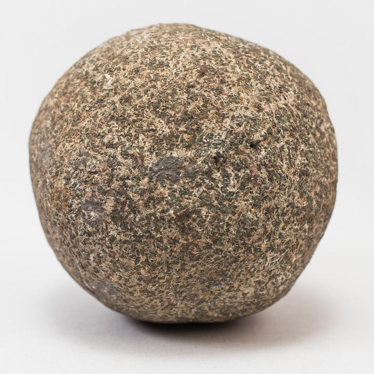 A set of five iron and stone balls.