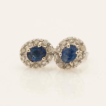 Earrings, a pair, 18k white gold with brilliant-cut diamonds and sapphire.