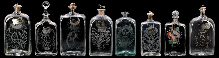 BRÄNNVINSFLASKOR, 8st, glas, 1800-1900-tal.