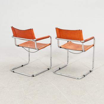 A set fo six Italian late 20th century chrome and leather armchairs.