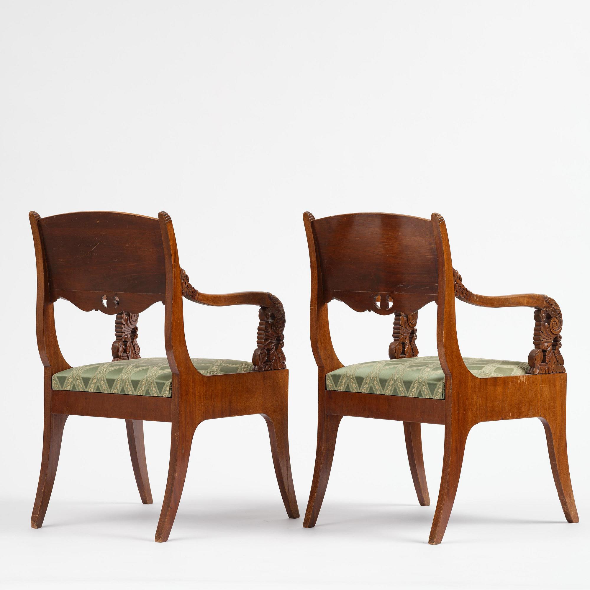 A pair of Baltic / Russian mahogany Empire armchairs, first part 19th century.