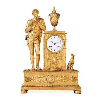 A French Empire early 19th century gilt bronze mantel clock.