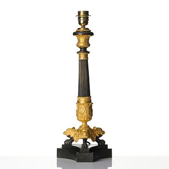 A French Louis Philippe ormolu and patinated bronze lamp, first part 19th century.
