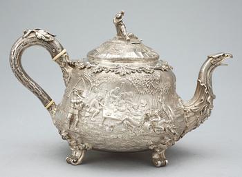 An English 19th century parcel-gilt tea-pot, marks of John Samuel Hunt, London 1849.