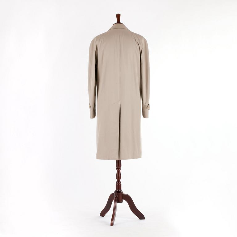 BURBERRY, a men's beige cottonblend trenchcoat.