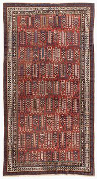 An antique carpet, probably Shirvan, c. 330 x 172 cm.